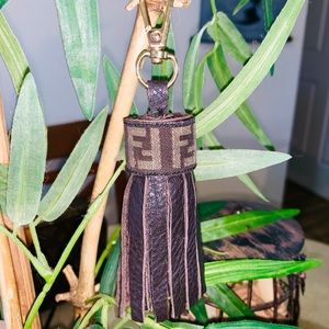 Repurposed handmade Fendi tassel.